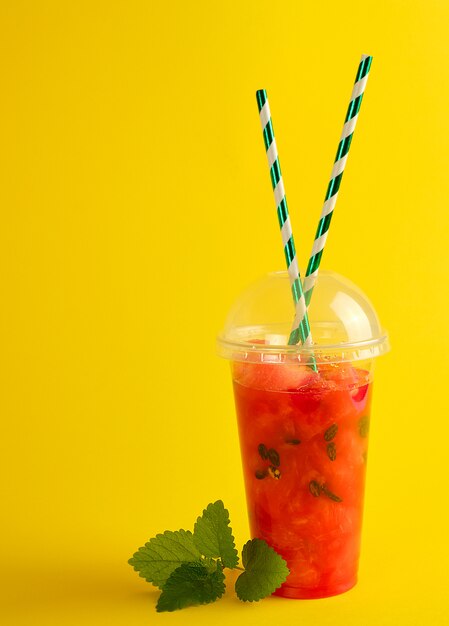 Download Premium Photo Smoothie From Ripe Red Watermelon In A Plastic Cup