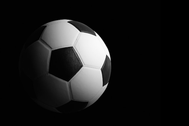 Premium Photo | Soccer ball detail on black background