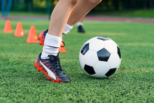 Premium Photo Soccer Player Kicking Ball On Field Soccer Players On Training Session Close Up Footballer Feet