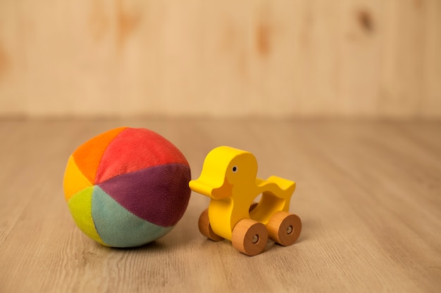 wooden toy duck on wheels