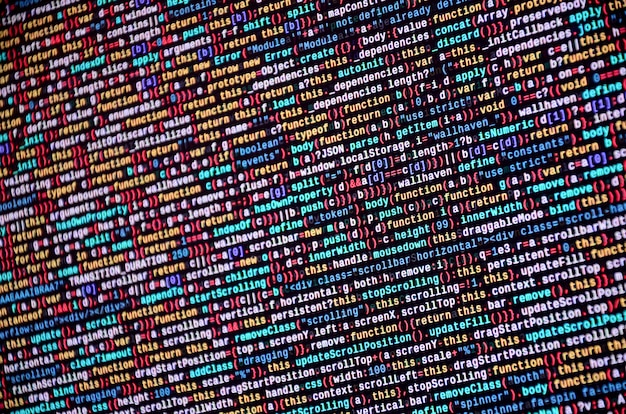 Software developer programming code on computer. abstract computer script source code Premium Photo