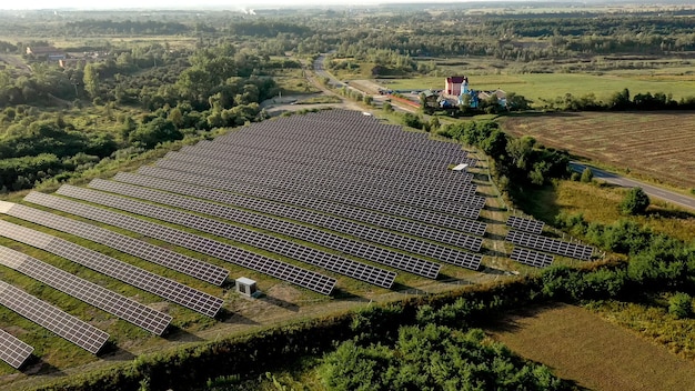 Solar panels in aerial view. posolar panels in aerial view. power farm producing clean energy Premium Photo