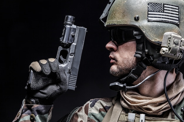 Premium Photo | Soldier with pistol