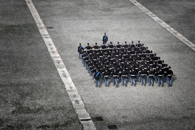 Premium Photo | Soldiers marching on the road