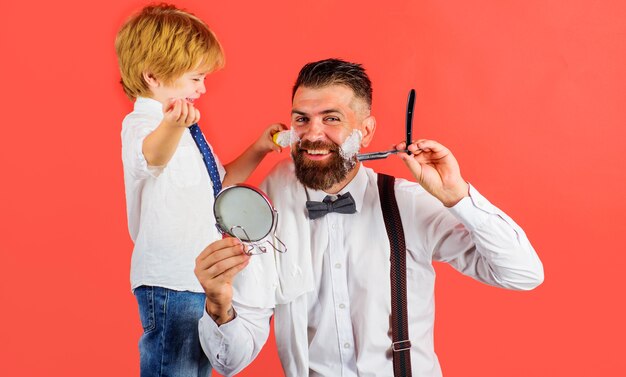 Premium Photo Son And Father In Barber Shop Shaving In Barbershop Assistant For Dad Fathers Day Little Barber Barber Shop Advertising