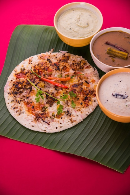 Premium Photo | South indian food uttapam or ooththappam or uthappa is ...