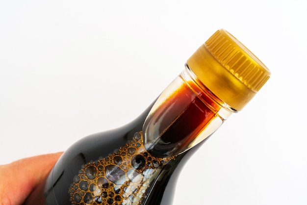 Premium Photo | Soy sauce in a glass bottle