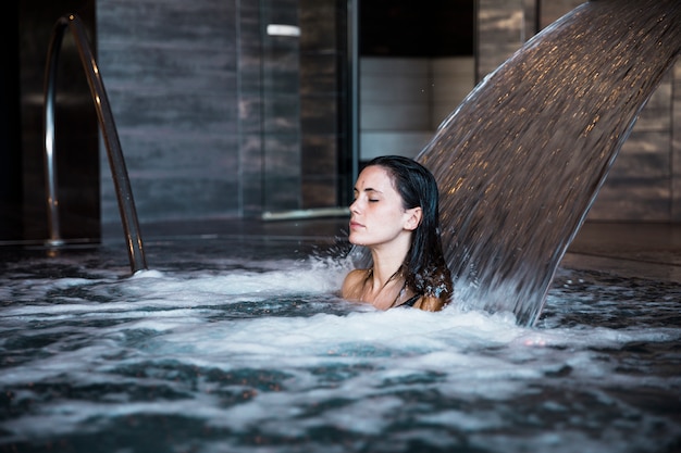 Free Photo | Spa concept with woman relaxing in water