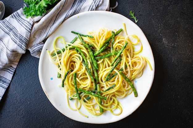 Premium Photo | Spaghetti green bean asparagus sauce cheese pasta