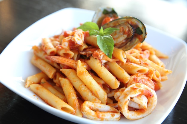 Premium Photo | Spaghetti penne with seafood