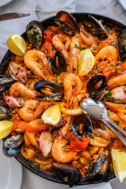 Premium Photo | Spanish seafood paella rice dish with fresh shrimp
