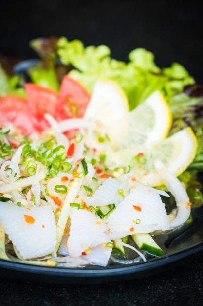 Free Photo | Spicy squid salad