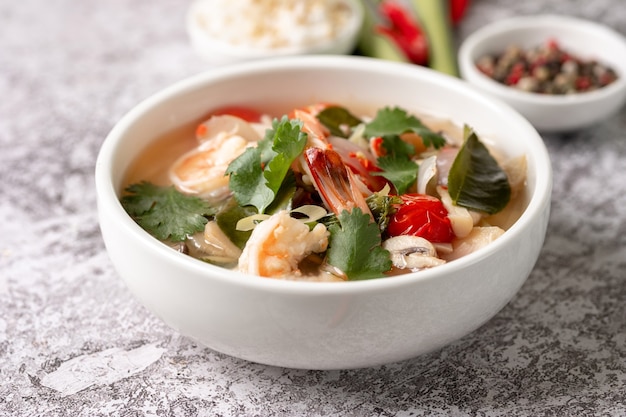 Premium Photo | Spicy tom yam kung, tom yum sour soup with shrimp ...