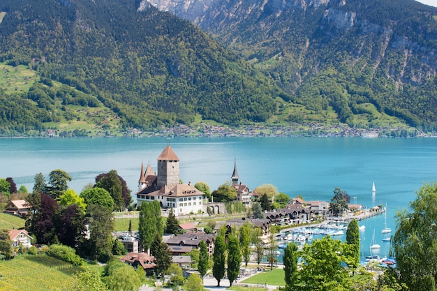 Premium Photo | Spiez castle on lake thun in bern, switzerland.