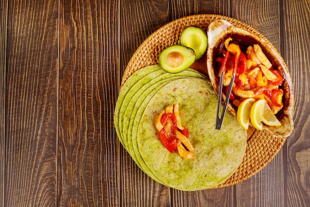 Premium Photo Spinach Wrap With Stir Fry Chicken And Vegetable