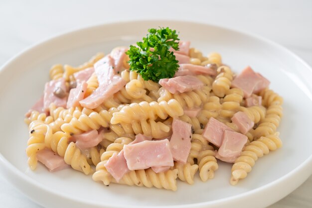 Premium Photo Spirali Or Spiral Pasta Mushroom Cream Sauce With Ham