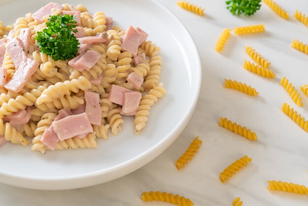 Premium Photo Spirali Or Spiral Pasta Mushroom Cream Sauce With Ham