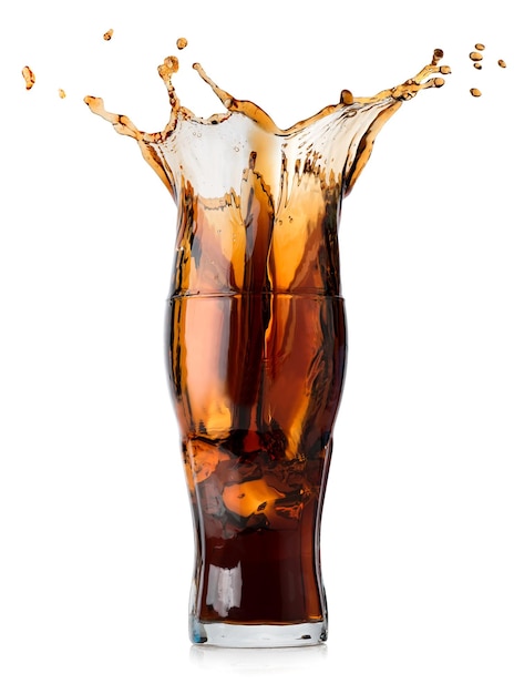 Premium Photo | Splash of cola in a glass isolated on a white background