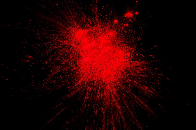 Splash Of Red Paint On Black Surface Photo Free Download