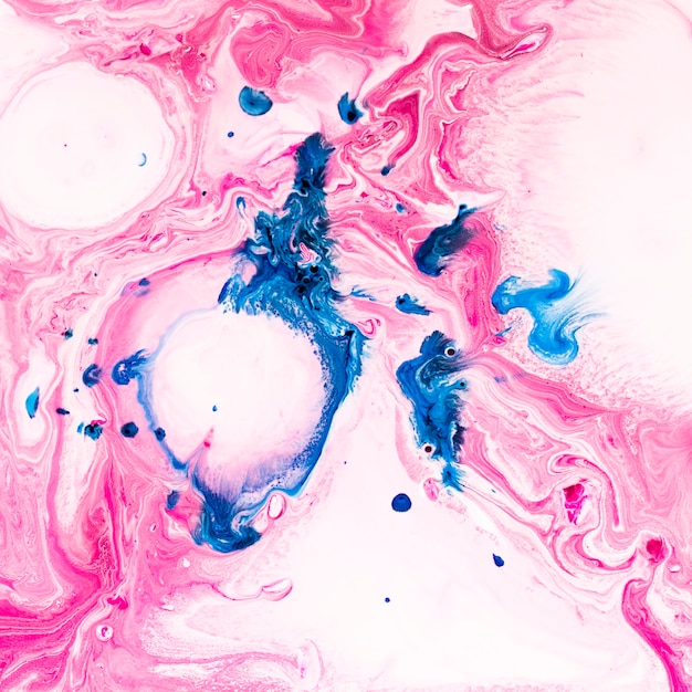 Free Photo | Splashes of paint with colored swirls