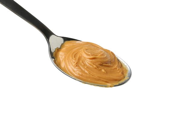 Premium Photo | Spoon with peanut butter isolated on white background