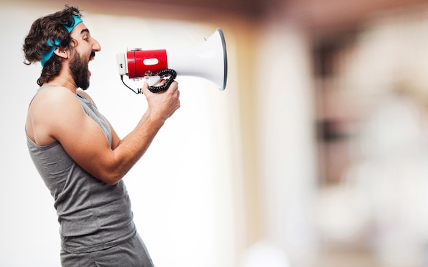 Sport man with a megaphone Free Photo
