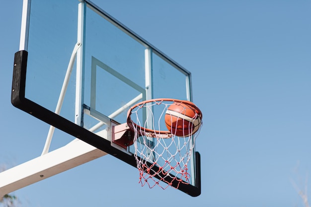 Premium Photo | Sports and recreation concept a basketball shot flowing ...