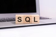 Premium Photo Sql Wooden Cubes With Letters On A Silver Laptop Keyboard Sql Short For 