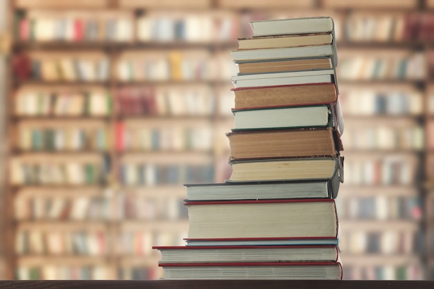 Premium Photo Stack Of Books On The Table