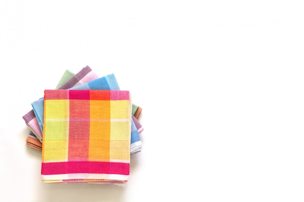 Stack of folded handkerchiefs on white background, copy space Premium Photo