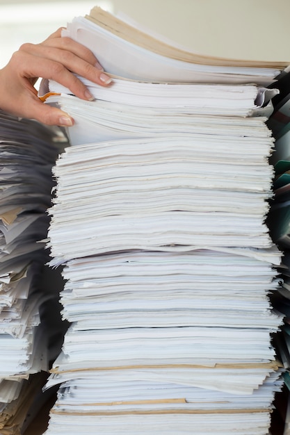 Premium Photo | Stack of office paper business documents.