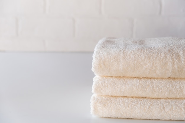 white fluffy bath towels