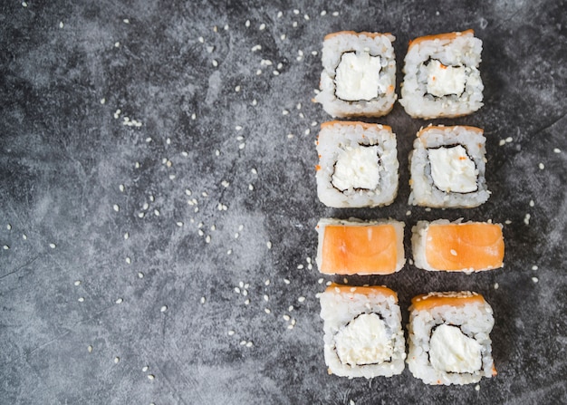 Stacked sushi with seeds and copy-space Free Photo