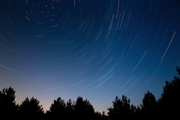 Premium Photo | Star trail in the night sky