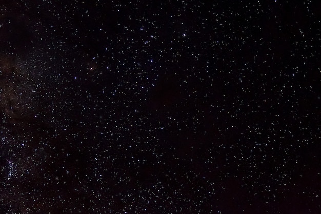 光沢のあるスターフィールドの星と銀河宇宙宇宙空夜宇宙黒星空の背景 プレミアム写真