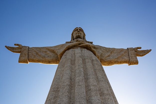 Statue of christ in lisbon, sanctuary of christ the king - cristo rei Premium Photo
