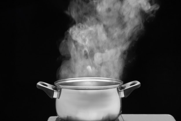 Premium Photo | Steam over cooking pot in kitchen