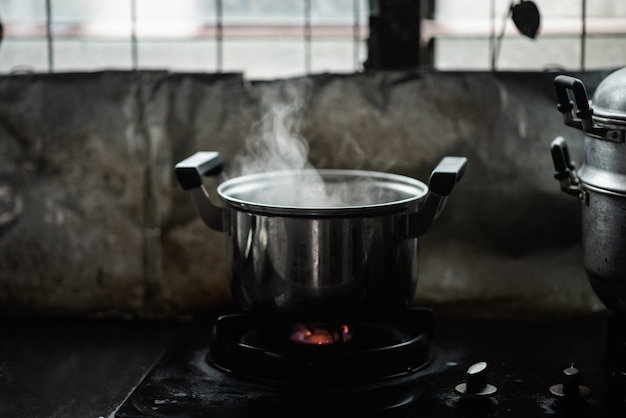 Premium Photo Steam Over Cooking Pot In Kitchen