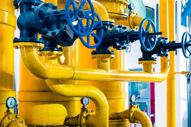 Steel pipelines and cables in a plant  Photo | Free Download