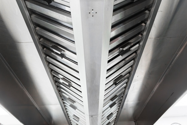 Steel shiny clean cooker  hood  in a restaurant  Photo 