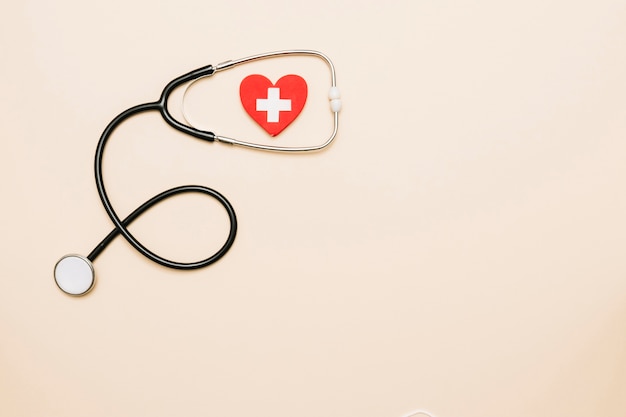 Stethoscope and heart with cross | Free Photo