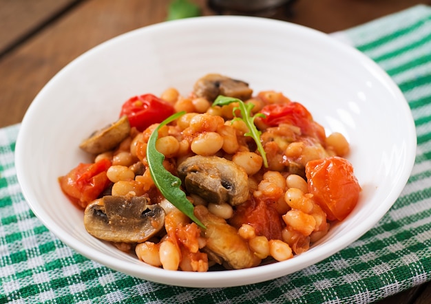 Premium Photo Stewed White Beans With Mushrooms And Tomatoes With