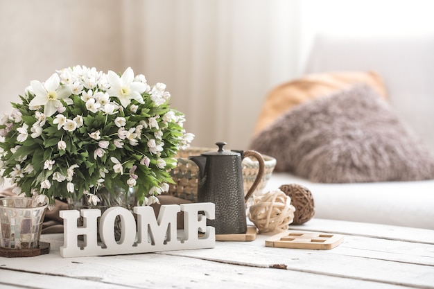 Still life in the living room with wooden inscription home Free Photo