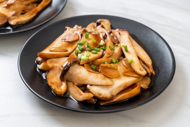 Premium Photo Stir Fried King Oyster Mushroom In Oyster Sauce 