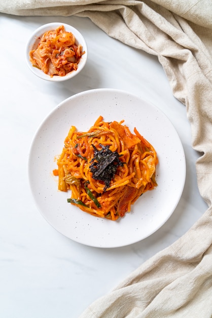 Premium Photo | Stir fried noodles with korean spicy sauce and vegetable