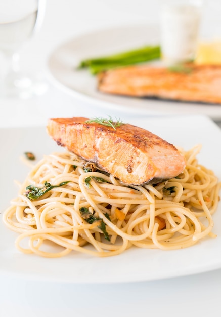 Free Photo | Stir-fried spicy spaghetti with salmon