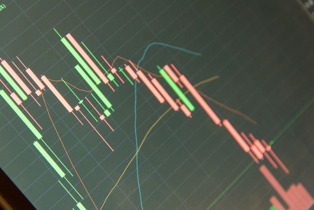 Premium Photo | Stock market chart on blue background share drop down