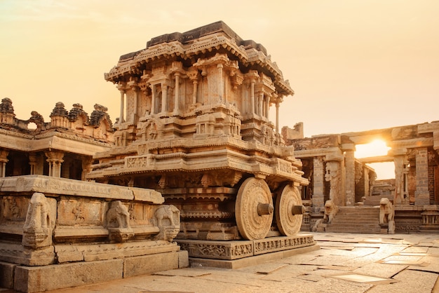 Premium Photo | Stone chariot in hampi vittala temple at sunset