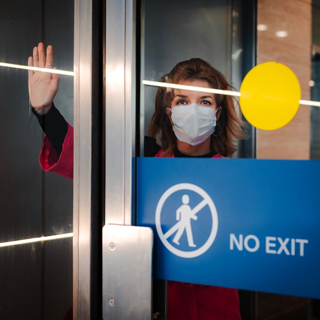 Download Free Stop Infection Woman Shows Stop Gesture Through Glass Door There Use our free logo maker to create a logo and build your brand. Put your logo on business cards, promotional products, or your website for brand visibility.