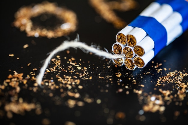 Stop smoking concept with broken cigarettes. heap of cigarettes. no smoking Premium Photo